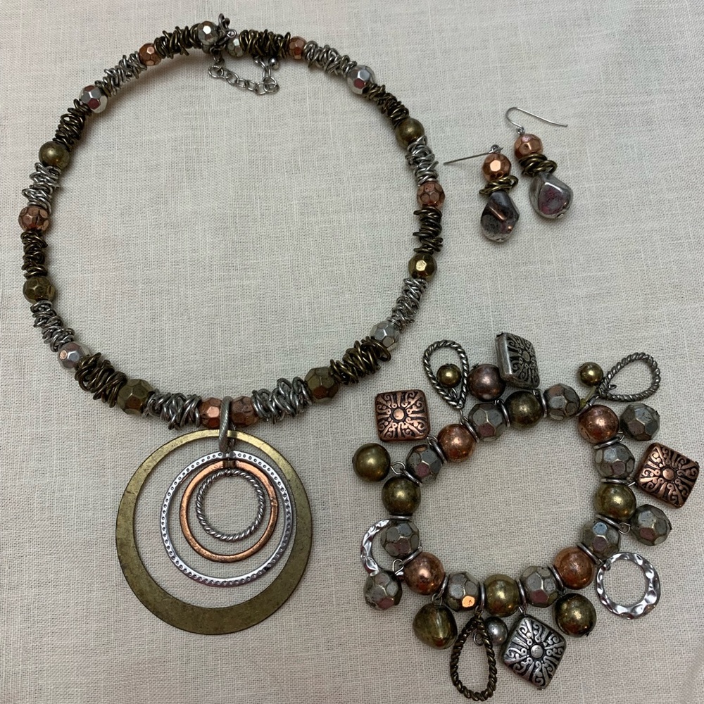 Statement necklace, bracelet and earring set.